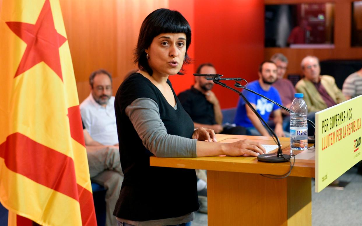 Leading Catalan separatist Anna Gabriel, who has fled to Switzerland, speaking at a conference in 2015 - AFP