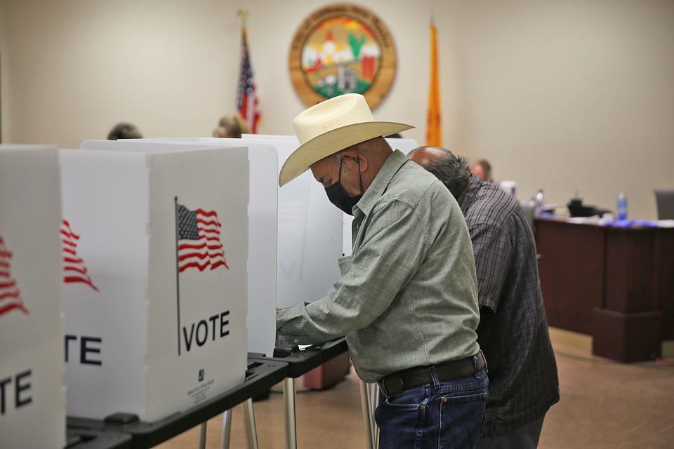 A resident of Anthony, New Mexico casts his vote at the Anthony City Hall on Nov. 2, 2021. 