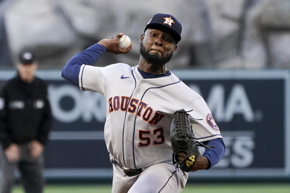 Houston Astros starting pitcher Cristian Javier throws to the plate during the first inning of a baseball game against the Los Angeles Angels Wednesday, July 13, 2022, in Anaheim, Calif. (AP Photo/Mark J. Terrill)