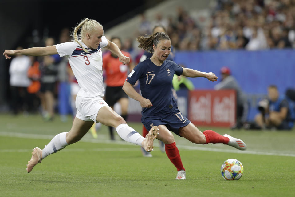 Norway's Maria Thorisdottir, left, vies for the ball with France's Gaetane Thiney during the Women's World Cup Group A soccer match between France and Norway in Nice, France, Wednesday, June 12, 2019. (AP Photo/Claude Paris)