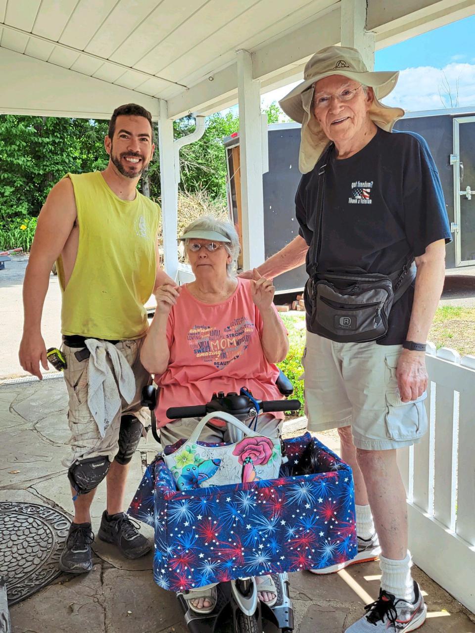 Andrew with house recipients, Bob and Joanie Lesko building homes for veterans