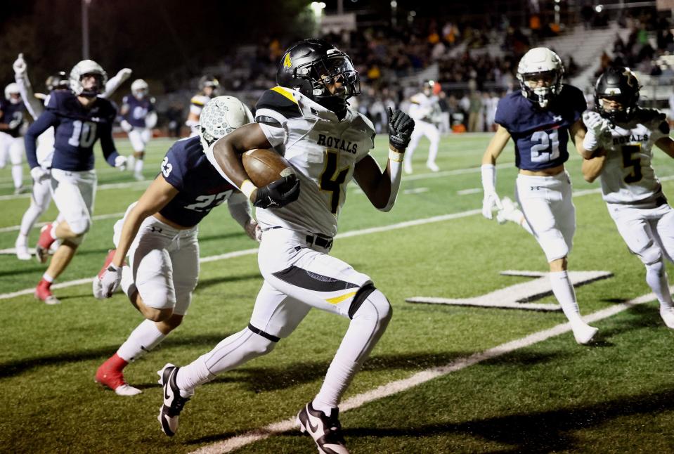 Roy’s DaeQwan Snider runs down he sideline on his way to a touchdown against Woods Cross play at Woods Cross High School on Friday, Sept. 22, 2023. | Scott G Winterton, Deseret News