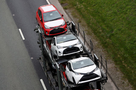 FILE PHOTO: New Toyota cars are transported from their manufacturing facility in Burnaston, Britain March 16, 2017. REUTERS/Darren Staples/File Photo