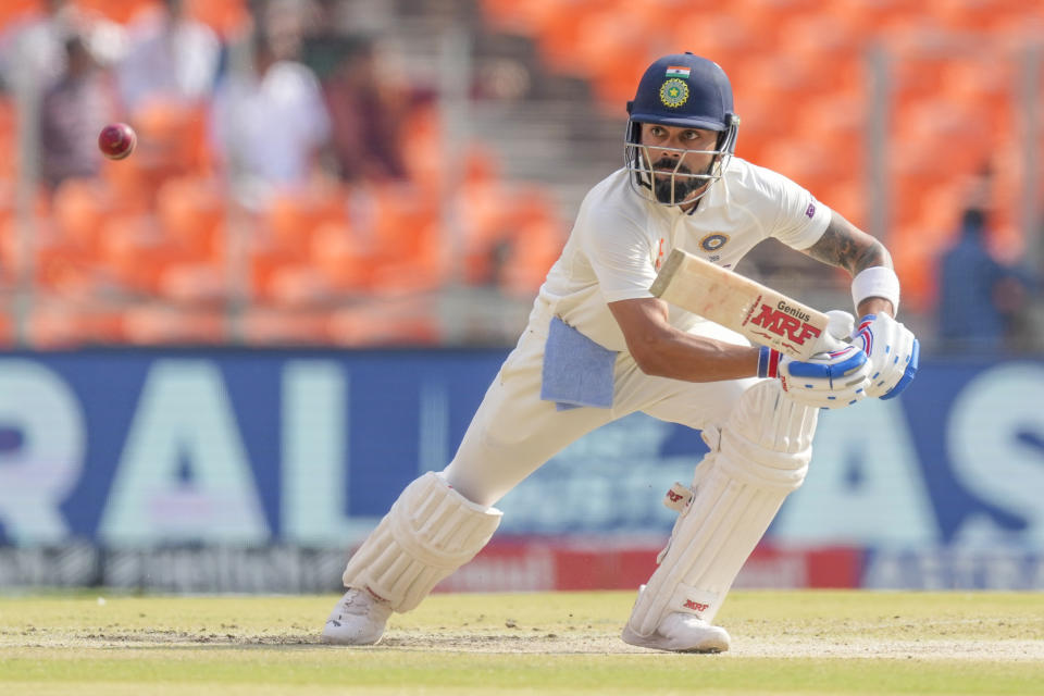 India's Virat Kohli watches the ball after playing a shot during the fourth day of the fourth cricket test match between India and Australia in Ahmedabad, India, Sunday, March 12, 2023. (AP Photo/Ajit Solanki)