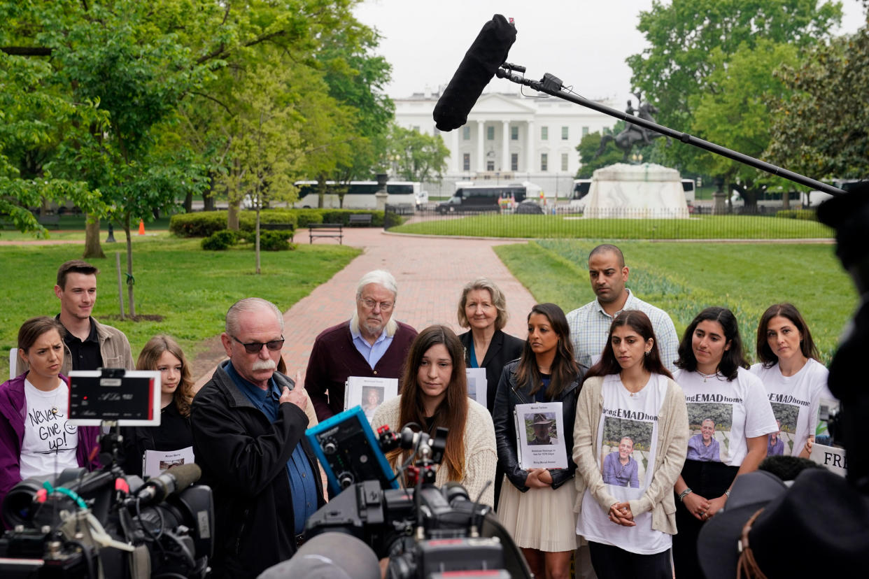 Joey Reed speaks alongside his daughter Taylor Reed, center, and families of Americans currently being held hostage or wrongfully detained overseas