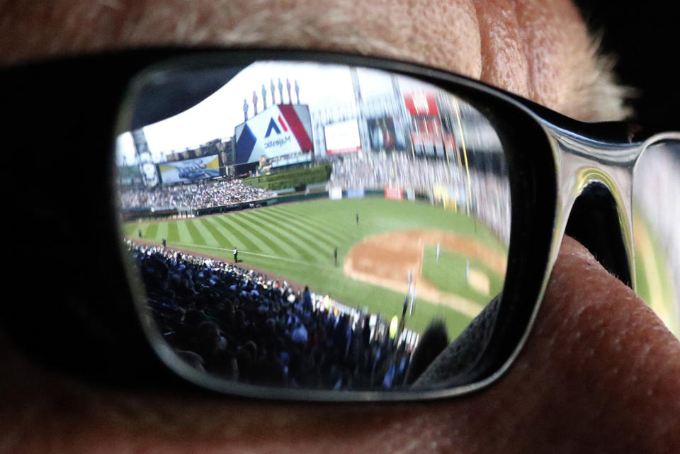 Baseball game reflected in sunglasses