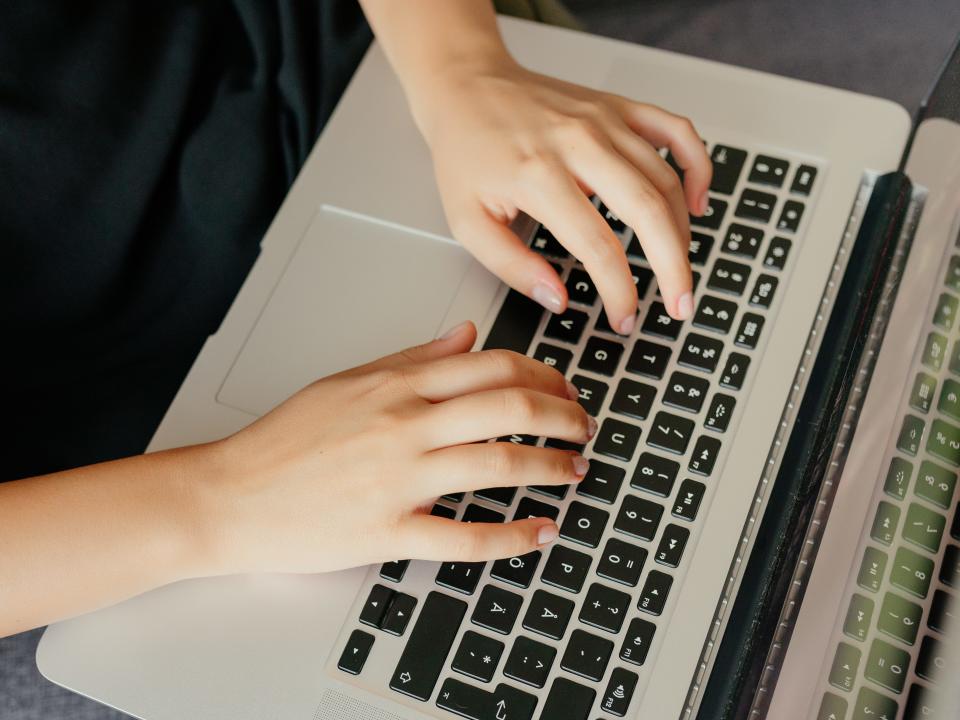 typing computer laptop