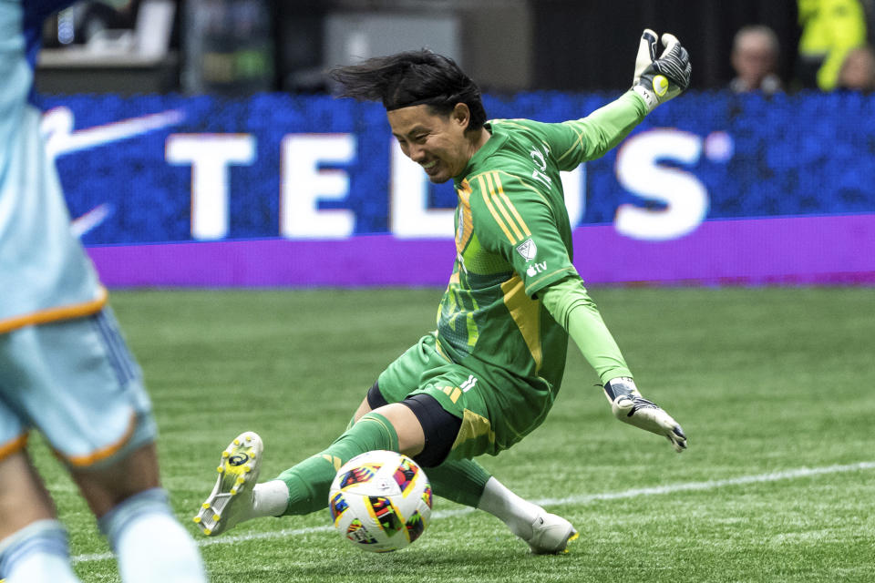 Vancouver Whitecaps goalkeeper Yohei Takaoka makes a save against the Colorado Rapids during the first half of an MLS soccer match Saturday, June 1, 2024, in Vancouver, British Columbia. (Ethan Cairns/The Canadian Press via AP)