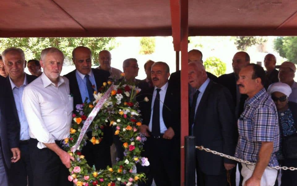 Labour leader Jeremy Corbyn pictured in 2014 holding a wreath at a cemetery in Tunis