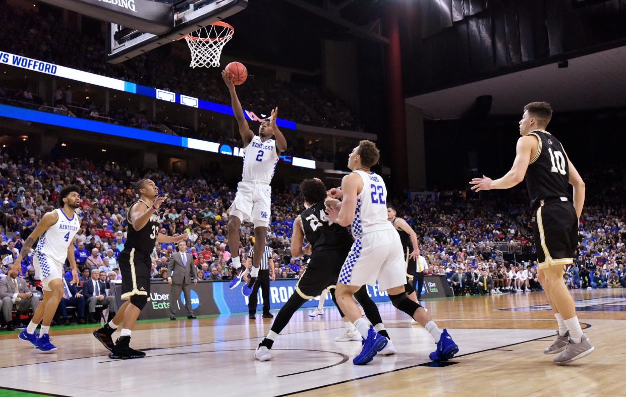 Kentucky guard Ashton Hagans (2) goes up for a shot against Wofford in their second round match of the NCAA Men's Basketball Championship Saturday, March 23, 2019 at VyStar Veterans Memorial Arena in Jacksonville, Florida. [Will Dickey/Florida Times-Union]