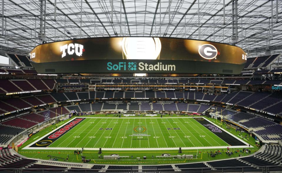 A general view of the SoFi Stadium and logos on the field before the CFP national championship game between TCU and Georgia on Monday.