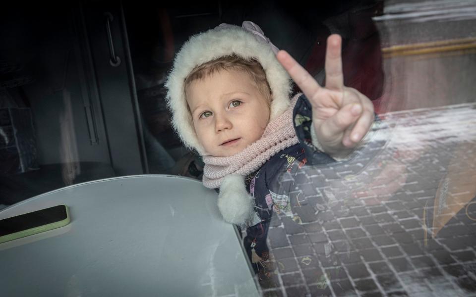 A child refugee from Mykolayiv leaves Odesa railway station bound for Lviv - Simon Townsley for The Telegraph 