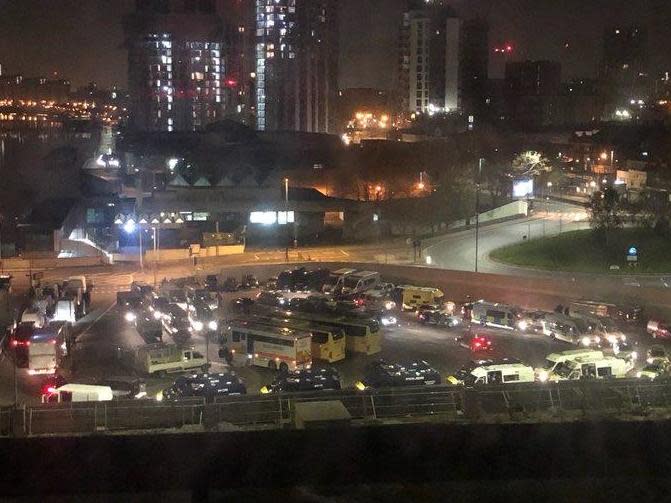 Police vehicles congregated near Woolwich ferry terminal before the raids: Hermacia Quintas