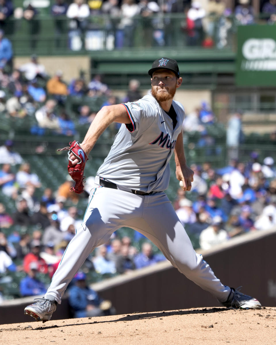 Miami Marlins starting pitcher A.J. Puk winds up during the first inning of a baseball game against the Chicago Cubs Friday, April 19, 2024, in Chicago. (AP Photo/Charles Rex Arbogast)