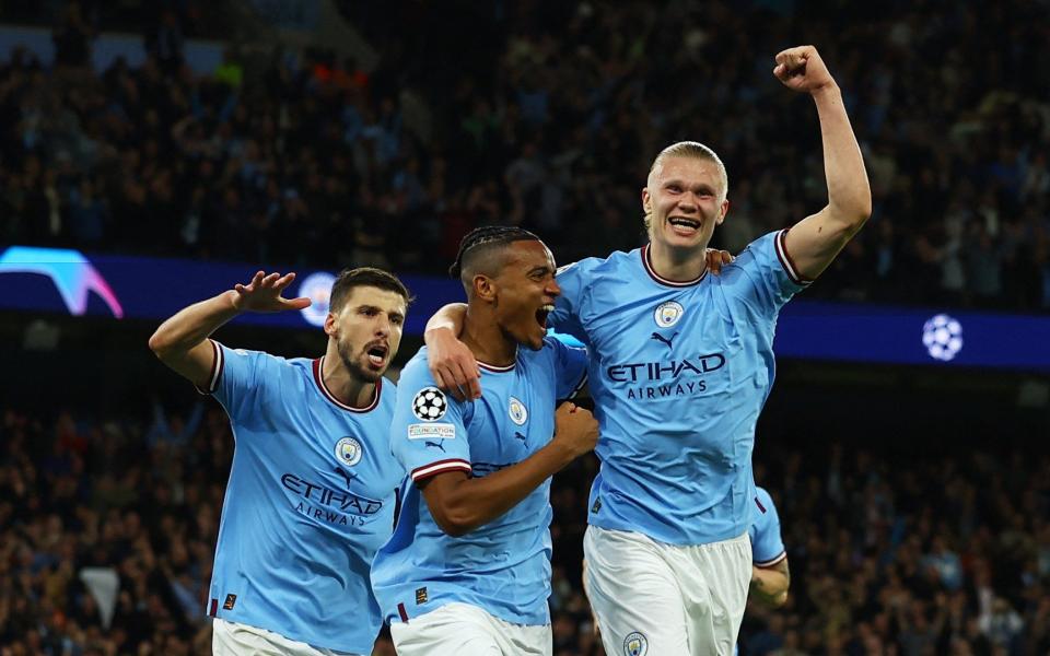 Man City's players celebrate their third goal against Real Madrid - Man City reach footballing perfection to stay on course for Treble - Reuters/Molly Darlington