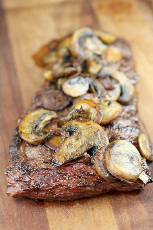 <p>Erica's Recipes</p><p><strong>Get the recipe: <a href="https://ericasrecipes.com/bistro-skirt-steak-with-garlic-butter-mushrooms/" rel="nofollow noopener" target="_blank" data-ylk="slk:Bistro Garlic Butter Skirt Steak With Mushrooms;elm:context_link;itc:0;sec:content-canvas" class="link rapid-noclick-resp">Bistro Garlic Butter Skirt Steak With Mushrooms</a></strong></p>