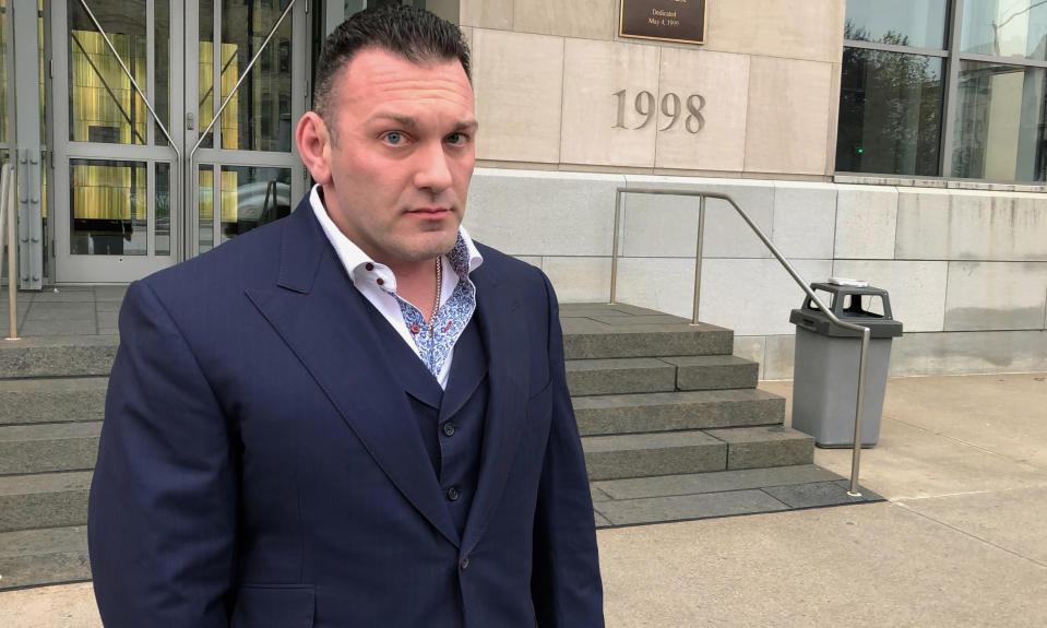 FILE - Perry Santillo walks outside the federal courthouse in Scranton, Pa., after pleading guilty to a federal fraud charge on Nov. 4, 2019. Santillo, once dubbed “King Perry”, was sentenced on Thursday, Jan. 13, 2022, to more than 17 years in prison for his role in masterminding a long-running investment scam that collected more than $115 million from 1,000 investors nationwide. (AP Photo/Michael Rubinkam. File)