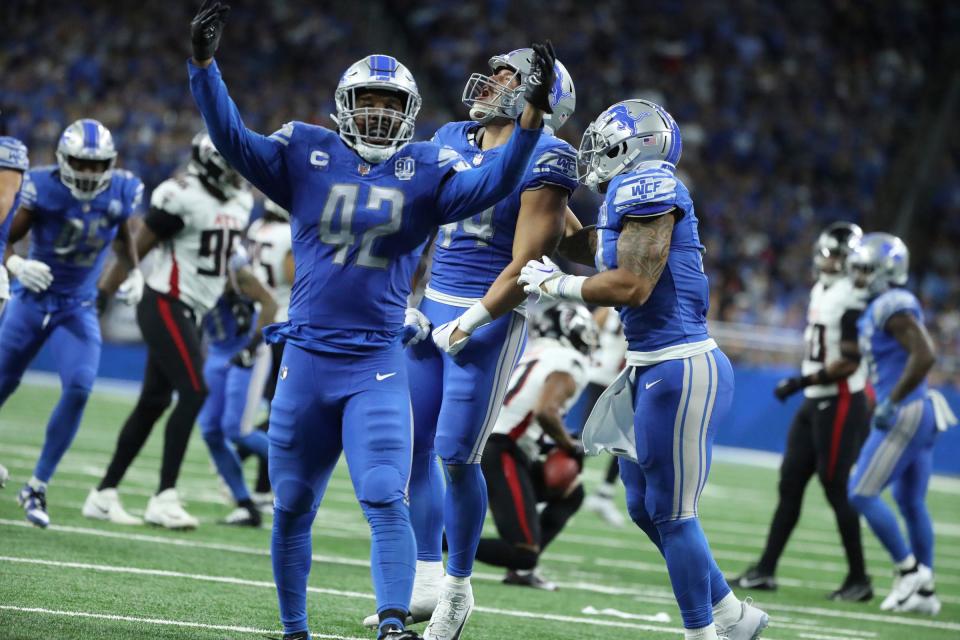 Detroit Lions linebackers Jalen Reeves-Maybin (42) celebrates a play by linebacker Malcolm Rodriguez (44) during the second half vs. the Atlanta Falcons at Ford Field, Sunday, Sept. 24, 2023.