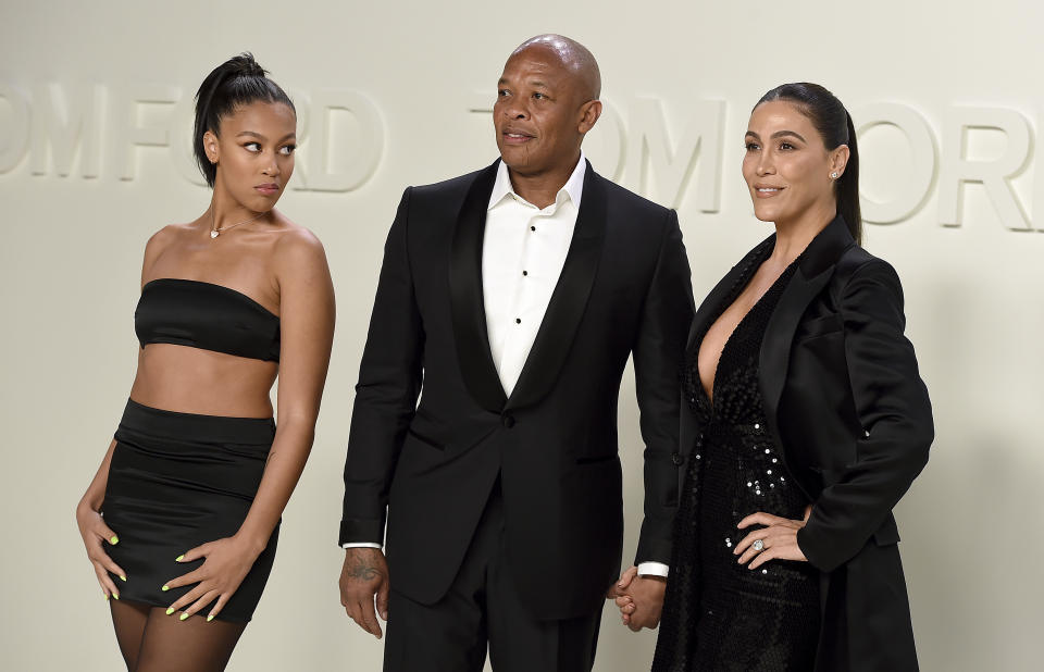 From left, Truly Young, Dr. Dre, and Nicole Young attend the Tom Ford show at Milk Studios during NYFW Fall/Winter 2020 on Friday, Feb. 7, 2020, in Los Angeles. (Photo by Jordan Strauss/Invision/AP)