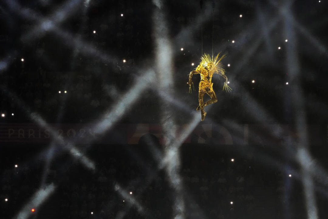 A performer during the closing ceremony of the 2024 Summer Olympics at the Stade de France, Sunday, Aug. 11, 2024, in Saint-Denis, France. (AP Photo/David Goldman)