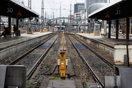 Stranded commuters wait for trains during a rail workers' strike across the country due to a pay dispute with Deutsche Bahn in Munich, Germany December 10, 2018. REUTERS/Martin Hangen