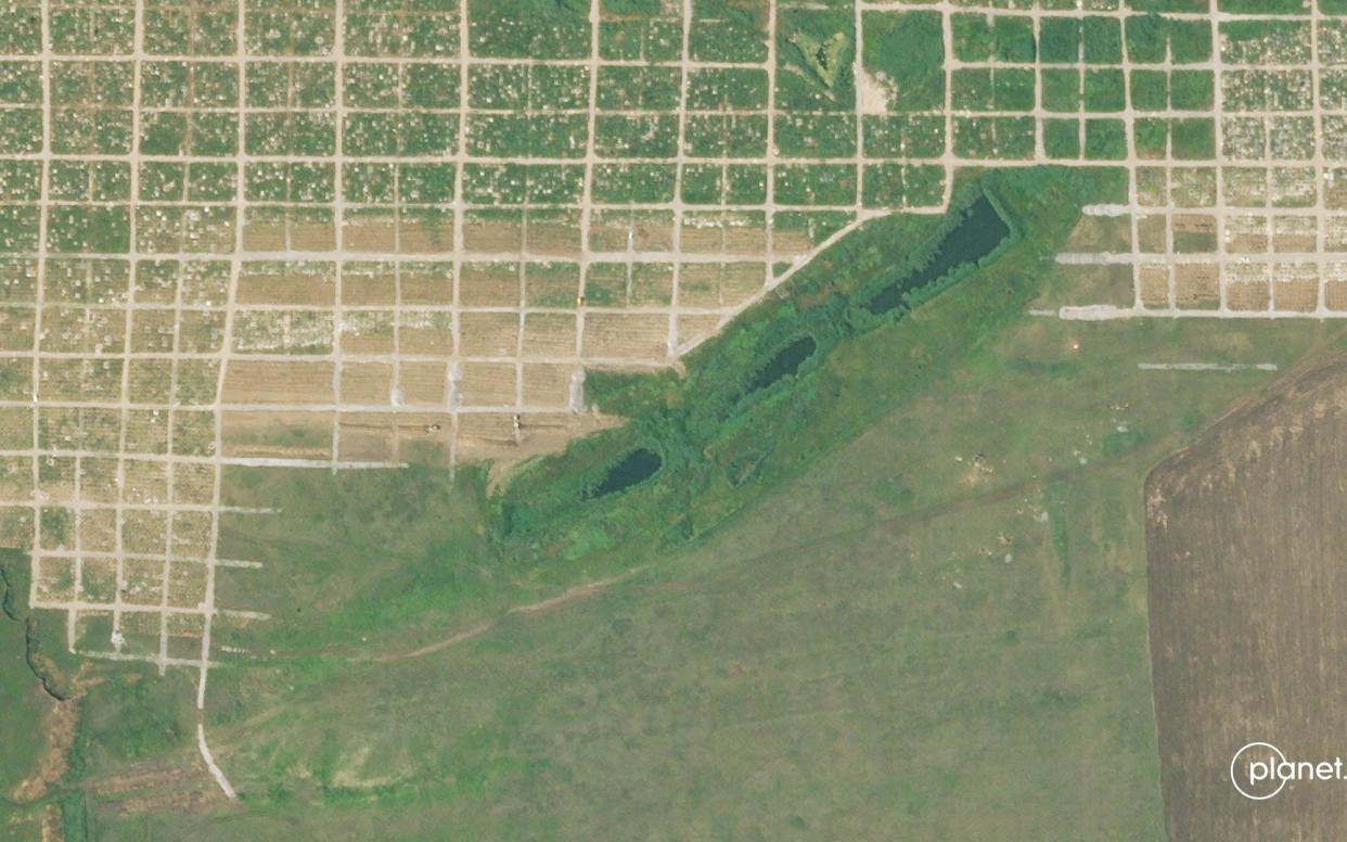 Mass graves in Staryi Krym, near Mariupol, Ukraine, on June 29 - PLANET LABS