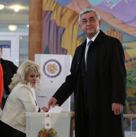 Armenia's President Serzh Sarksyan casts his ballot during a parliamentary election at a poling station in Yerevan, Armenia April 2, 2017. REUTERS/Vahram Baghdasaryan/Photolure