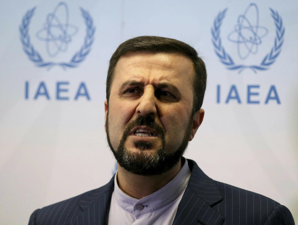 FILE - In this July 10, 2019, file photo,. Iran's Ambassador to the International Atomic Energy Agency, IAEA, Gharib Abadi speaks to the media after the IAEA board of governors meeting at the International Center in Vienna, Austria. President Donald Trump’s “maximum pressure” campaign against Iran is at a crossroads as his administration wrestles with whether to risk stoking international tensions even more by ending one of the last remaining components of the 2015 nuclear deal. (AP Photo/Ronald Zak, File)