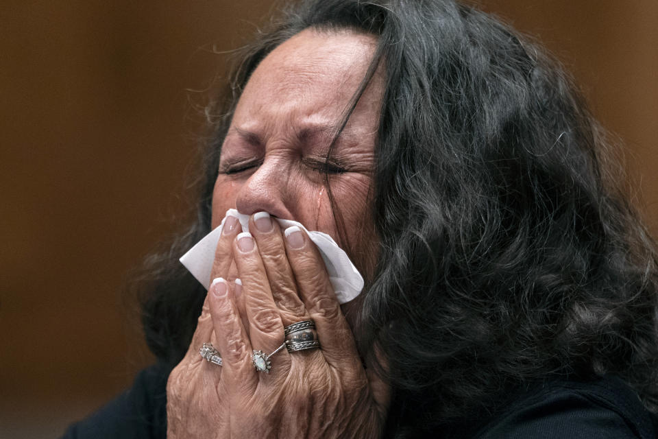 Belinda Maley, mother of Matthew Loflin, who died in the Chatham County Detention Center in Georgia, cries as a recorded call between her and her son when he was in custody after being arrested is played, during a Senate Homeland Security and Governmental Affairs Subcommittee on Investigations hearing, "Uncounted Deaths in America's Prisons and Jails," on Capitol Hill in Washington. (AP Photo/Jacquelyn Martin)