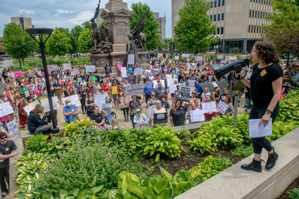 Christina Norton, chair of the Roe v. Wade committee of the Peoria chapter of the Democratic Socialists of America, speaks to a large group of protesters Saturday, June 25, 2022, at the Peoria County Courthouse in downtown Peoria. The rally attracted about 350 people protesting the overturning of federal constitutional protection of abortion rights.