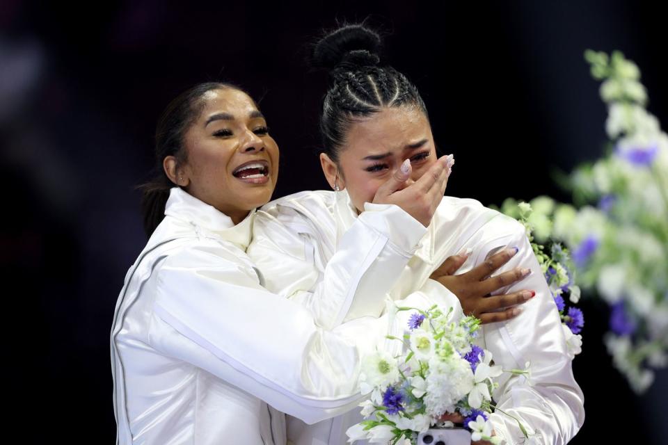 <p>Elsa/Getty</p> Jordan Chiles (left) and Suni Lee react after being selected for the 2024 U.S. Olympic women