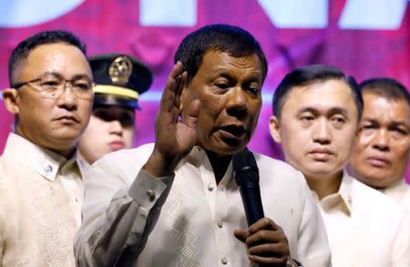 Philippine President Rodrigo Duterte speaks to protesters after he delivered his State of the Nation address at the Congress in Quezon city, Metro Manila Philippines July 24, 2017. REUTERS/Erik De Castro