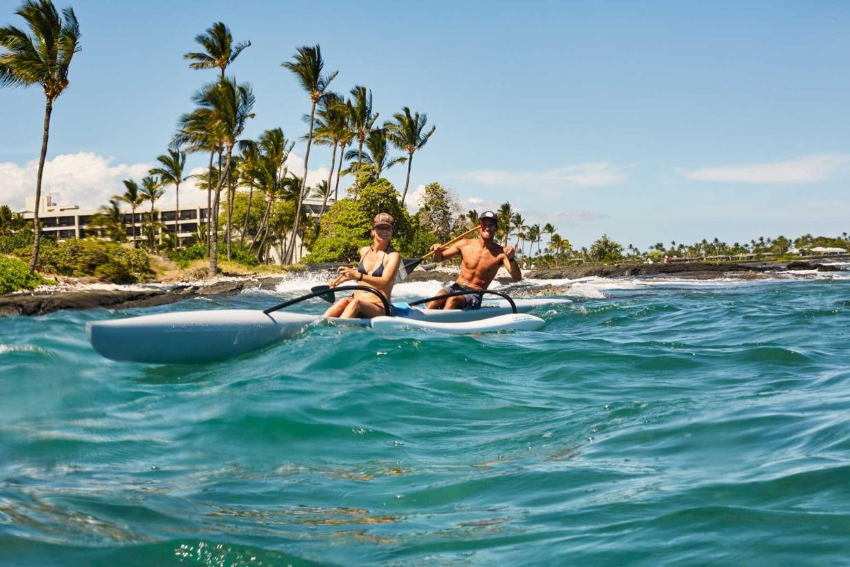 Carolyn Murphy in Hawaii, on water and in Mother Denim