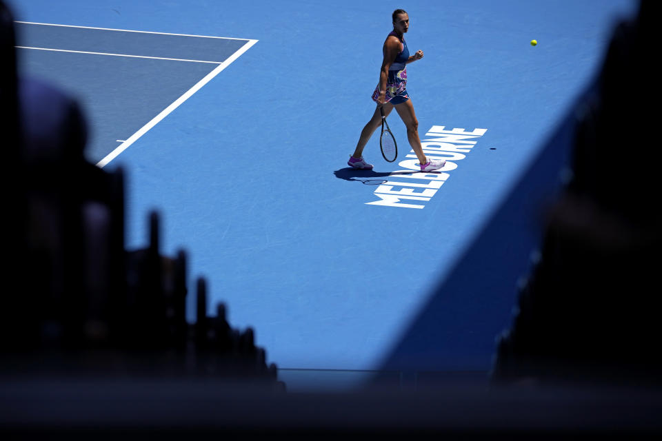 FILE - Aryna Sabalenka of Belarus reacts during her quarterfinal against Donna Vekic of Croatia at the Australian Open tennis championship in Melbourne, Australia, Wednesday, Jan. 25, 2023. The 2024 Australian Open, the year's first Grand Slam tennis tournament, begins at Melbourne Park on Sunday morning (Saturday night ET). That's a day earlier than usual, creating a 15-day event for the first time. (AP Photo/Aaron Favila, File)