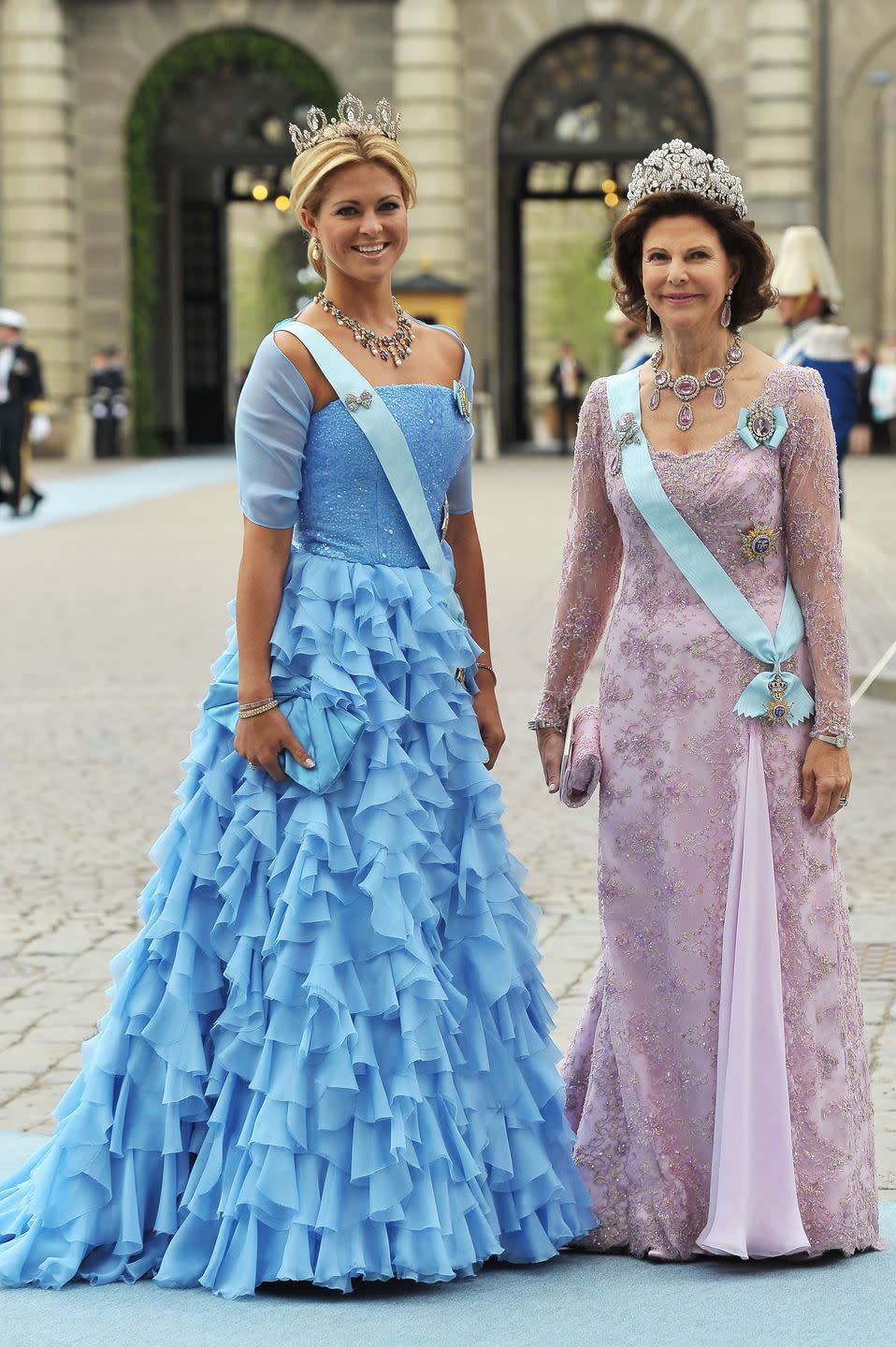 <p>Madeleine and her mother, Queen Silvia, pose for a portrait on the day of Crown Princess Victoria's royal wedding. This was the first time Madeleine wore one of her family's most celebrated jewels: the <a href="https://www.thecourtjeweller.com/2016/05/the-connaught-diamond-tiara.html" rel="nofollow noopener" target="_blank" data-ylk="slk:Connaught Diamond Tiara;elm:context_link;itc:0;sec:content-canvas" class="link ">Connaught Diamond Tiara</a>.</p>