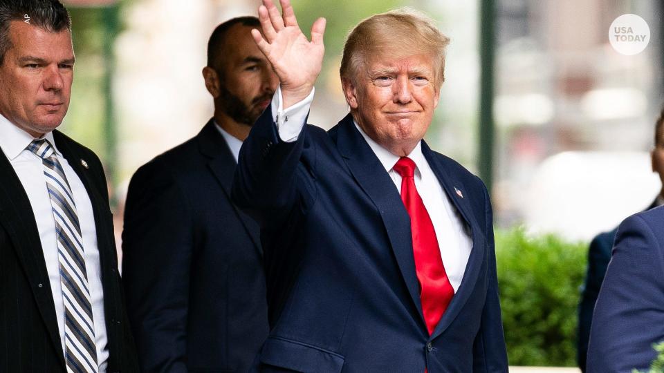 Former President Donald Trump waves as he departs Trump Tower, Wednesday, Aug. 10, 2022, in New York, on his way to the New York attorney general's office for a deposition in a civil investigation. (AP Photo/Julia Nikhinson)