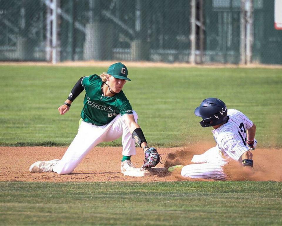 Zach Jones takes second ahead of tag by Gavin Williams. Arroyo Grande High School fell to Garces Memorial from Bakersfield 6-4 in a baseball playoff on May 14, 2024.
