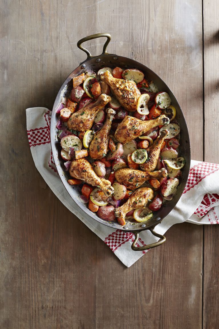 <p>This comforting classic gets a flavorful twist from mustard-tarragon sauce. </p><p><strong><a href="https://www.countryliving.com/food-drinks/recipes/a6125/chicken-drumsticks-vegetables-mustard-tarragon-sauce-recipe-clx1214/" rel="nofollow noopener" target="_blank" data-ylk="slk:Get the recipe;elm:context_link;itc:0;sec:content-canvas" class="link ">Get the recipe</a>.</strong></p><p><a class="link " href="https://www.amazon.com/Cuisinart-Classic-Stainless-Rectangular-7117-16UR/dp/B003YLJZ6M/?tag=syn-yahoo-20&ascsubtag=%5Bartid%7C10063.g.35055779%5Bsrc%7Cyahoo-us" rel="nofollow noopener" target="_blank" data-ylk="slk:SHOP ROASTING PANS;elm:context_link;itc:0;sec:content-canvas">SHOP ROASTING PANS</a> </p>