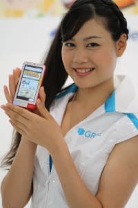 GREE model poses with Android Infobar phone, Tokyo Game Show 2011