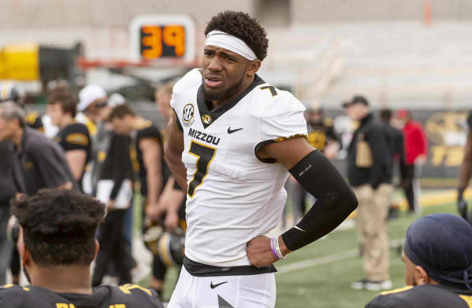 Missouri quarterback Kelly Bryant talks with teammates on the bench during an NCAA college football intra-squad spring game Saturday, April 13, 2019, in Columbia, Mo. (AP Photo/L.G. Patterson)