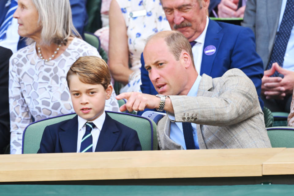 Prince George and Prince William at Wimbledon. 