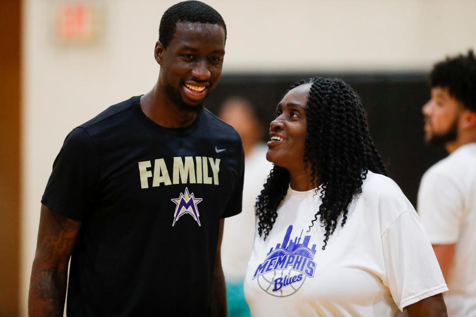 Alondray Rogers speaks with Jermal McGlown during a practice for Memphis Blues, a semi-pro basketball team Rogers owns and coaches, at Penny’s Gym in Memphis, Tenn., on Monday, April 1, 2024. The team offers a chance for area basketball players to extend their careers after college with hopes of landing on a professional team whether in the U.S. or abroad.