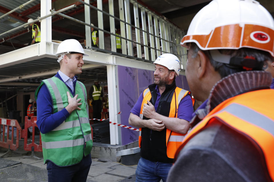 The Duke of Cambridge (left) with presenter Nick Knowles as he joins the crew of DIY SOS in Ladbroke Grove, west London, on a major project to support people affected by the devastating fire at Grenfell Tower.