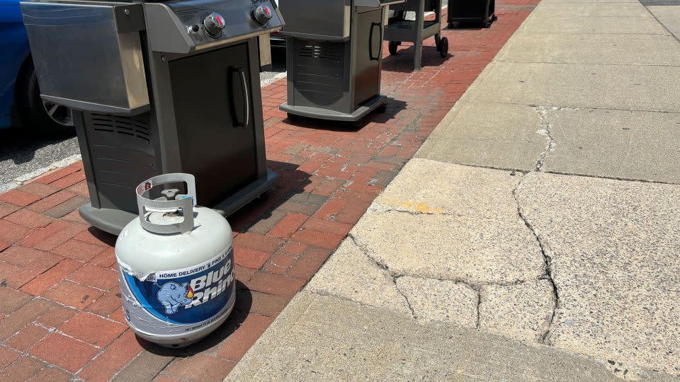 American Royal Hardware in Montclair, NJ, staff say they place barbecue grills on the sidewalk outside their store as a way to market the grills to motorists and pedestrians passing by at a busy town center. - Paul Glader/CNN