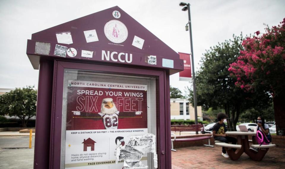 The mascot of N.C. Central University in Durham, N.C. can be seen on a sign encouraging social distancing on the first day of classes, Monday, Aug. 24, 2020.