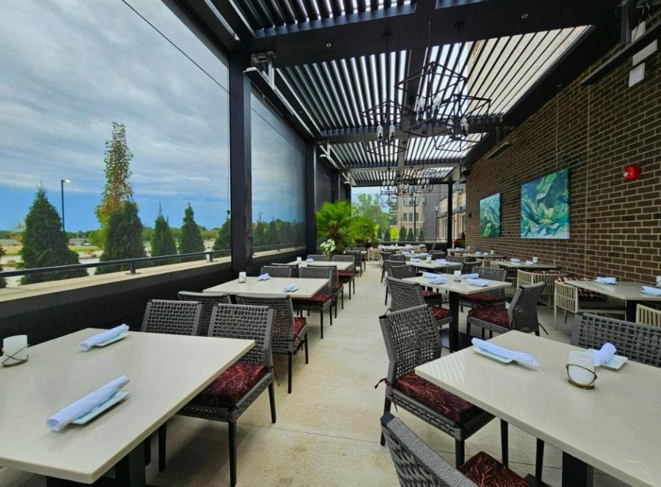 The first-floor patio sits along Jordan Creek Parkway with misters and heaters at Ruth's Chris Steak House in West Des Moines.