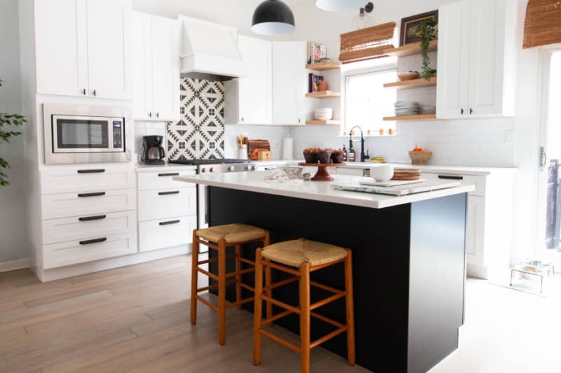 After: Black and white kitchen with geometric tile backsplash