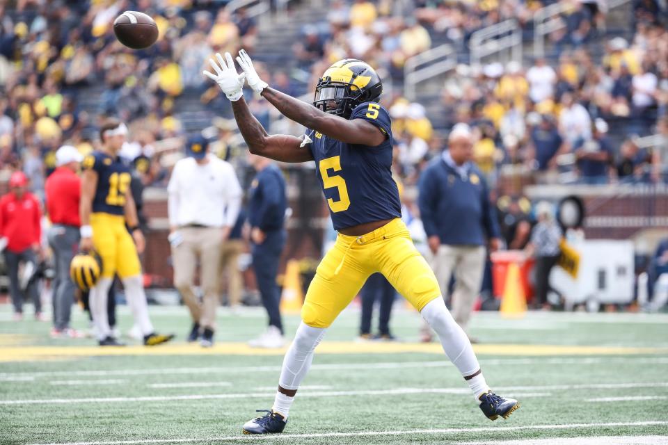 Michigan wide receiver Karmello English (5) practices before the UNLV game at Michigan Stadium in Ann Arbor on Saturday, Sept. 9, 2023.