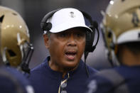Navy head coach Ken Niumatalolo talks to his players during the second half of an NCAA college football game against Memphis, Saturday, Sept. 10, 2022, in Annapolis, Md. Memphis won 37-13. (AP Photo/Nick Wass)
