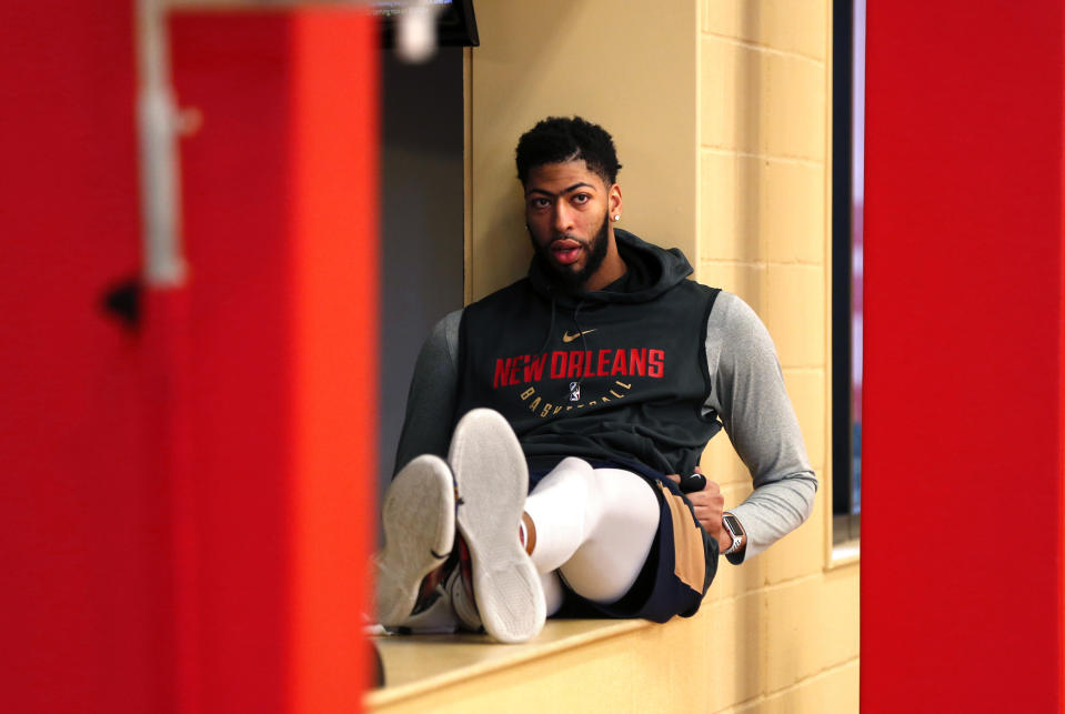 New Orleans Pelicans forward Anthony Davis waits to talk to reporters after their NBA basketball practice in Metairie, La., Friday, Feb. 1, 2019. (AP Photo/Gerald Herbert)